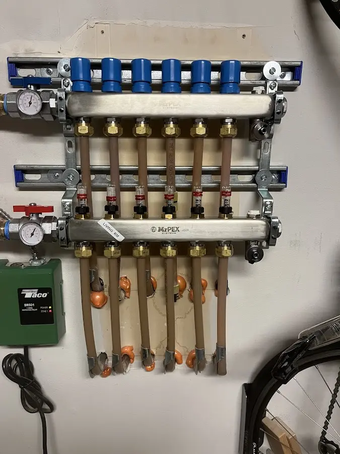 Plumber performing Water Heater Repair at a residential property in Homedale